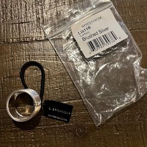 NWT - L Erickson brushed silver pony holder